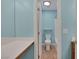 Bathroom view showcasing a toilet, vanity, and walk-in shower with natural light at 4225 Telstar Ct, North Las Vegas, NV 89032