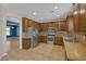 Gourmet kitchen features stainless steel appliances, ample cabinets and granite countertops at 4225 Telstar Ct, North Las Vegas, NV 89032