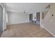 Bright living room features tile floors, a ceiling fan, and access to the backyard at 4225 Telstar Ct, North Las Vegas, NV 89032