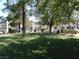 Well-manicured community grounds with trees and shrubs, providing scenic views for residents at 5006 Schumann Dr, Las Vegas, NV 89146