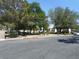 Community grounds featuring mature trees, manicured shrubs, and well-maintained lawn at 5006 Schumann Dr, Las Vegas, NV 89146