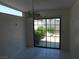 Bright dining area with a large sliding door leading to an outdoor space at 5006 Schumann Dr, Las Vegas, NV 89146