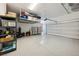 Spacious garage with epoxy floor, storage racks and side cabinets perfect for organization at 5095 E Long Leaf Ct, Pahrump, NV 89061