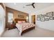 Comfortable main bedroom with warm colors and a large bed at 5095 E Long Leaf Ct, Pahrump, NV 89061