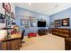Stylish office with a desk, shelving, and decor at 5095 E Long Leaf Ct, Pahrump, NV 89061