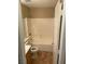 This bathroom has neutral colored walls, a tub/shower combo and a single sink vanity at 5307 Wild Orchid St, North Las Vegas, NV 89031