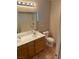 Full bathroom featuring double sink vanity, tile flooring and a bathtub at 5307 Wild Orchid St, North Las Vegas, NV 89031
