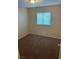 This bedroom has carpeted floors and window with blinds allowing natural light to brighten the space at 5307 Wild Orchid St, North Las Vegas, NV 89031