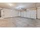 Spacious two-car garage with an automatic door and utility hookups at 5307 Wild Orchid St, North Las Vegas, NV 89031