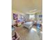 This bedroom features a twin bed, one window, and room for many toys at 5704 Heron Ave, Las Vegas, NV 89107