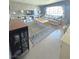 Spacious living room features a stylish rug, modern decor, and comfortable sofa at 5704 Heron Ave, Las Vegas, NV 89107