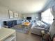 Inviting living room boasts neutral tones, comfortable seating, and ample natural light at 5704 Heron Ave, Las Vegas, NV 89107