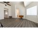 Bright living room features wood flooring, high ceilings, and natural light at 5835 Running Horse Dr, North Las Vegas, NV 89081