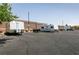 RV parking lot with multiple recreational vehicles, including trailers and campers at 5835 Running Horse Dr, North Las Vegas, NV 89081