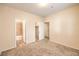 A spacious bedroom with an ensuite bathroom, walk in closet and carpeted floors at 5950 Barbosa Dr # 8, North Las Vegas, NV 89031