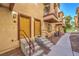 Exterior view of multiple condo entryways with steps leading up to the front doors at 5950 Barbosa Dr # 8, North Las Vegas, NV 89031