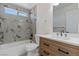 Bathroom with a tub, tiled shower, vanity, and modern finishes at 6019 Sonoma Station Ave, Las Vegas, NV 89139