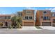 Charming two-story home with a two-car garage, desert landscaping, and neutral exterior paint at 6019 Sonoma Station Ave, Las Vegas, NV 89139