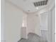Upstairs hallway featuring neutral paint and open layout to a bedroom at 6019 Sonoma Station Ave, Las Vegas, NV 89139