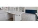 Spacious kitchen island with quartz countertop, dark cabinetry, and modern finishes for a stylish look at 6019 Sonoma Station Ave, Las Vegas, NV 89139