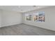 Bright and spacious living area with large windows offering natural light and a view of the neighborhood at 6019 Sonoma Station Ave, Las Vegas, NV 89139