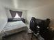 Bedroom featuring carpet flooring, a bed and a black computer chair at 6500 Hill View Ave, Las Vegas, NV 89107