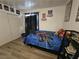 bedroom featuring playful decor and modern flooring at 6500 Hill View Ave, Las Vegas, NV 89107
