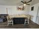 Dining area with granite counter island that offers seating and kitchen access at 6500 Hill View Ave, Las Vegas, NV 89107
