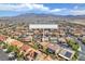 Expansive aerial view of the neighborhood with mountain views at 6659 Alder Flower Ct, North Las Vegas, NV 89084