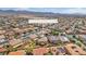 Scenic aerial view of community featuring well-maintained homes and desert landscape at 6659 Alder Flower Ct, North Las Vegas, NV 89084