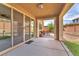 Covered patio with outdoor seating, ideal for relaxing and enjoying the backyard view at 6659 Alder Flower Ct, North Las Vegas, NV 89084