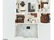 Detailed first floor plan showing layout of kitchen, living room, dining room, and garage at 6659 Alder Flower Ct, North Las Vegas, NV 89084