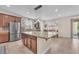 Bright and spacious kitchen with an oversized island, stainless steel appliances and lots of cabinets at 6659 Alder Flower Ct, North Las Vegas, NV 89084
