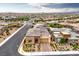 A beautiful single-story home with lush landscaping and an attractive brick driveway in a suburban neighborhood at 6728 Regency Ridge Ct, Las Vegas, NV 89148