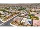 A beautiful home surrounded by a well-maintained neighborhood with mature trees and paved streets at 6728 Regency Ridge Ct, Las Vegas, NV 89148