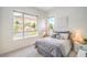 This bedroom features a mountain view and modern decor at 6728 Regency Ridge Ct, Las Vegas, NV 89148