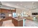 Modern kitchen with granite countertops, stainless appliances, and an open layout at 6728 Regency Ridge Ct, Las Vegas, NV 89148