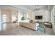 Spacious living room showcasing an open layout, tile floors, and neutral decor at 6728 Regency Ridge Ct, Las Vegas, NV 89148