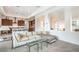Stylish living room with an open floor plan connecting to the kitchen and other living areas at 6728 Regency Ridge Ct, Las Vegas, NV 89148