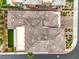 Detailed overhead shot of a home showcasing its durable roof, manicured yard, and proximity to street access at 6728 Regency Ridge Ct, Las Vegas, NV 89148