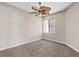Bedroom featuring carpet and ceiling fan at 7119 S Durango Dr # 211, Las Vegas, NV 89113