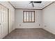 Bedroom featuring carpet and a ceiling fan at 7119 S Durango Dr # 211, Las Vegas, NV 89113