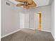 Bedroom with carpet and entry to bathroom at 7119 S Durango Dr # 211, Las Vegas, NV 89113