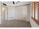 Bedroom featuring carpet and a ceiling fan at 7119 S Durango Dr # 211, Las Vegas, NV 89113