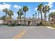 Community clubhouse with parking and well-manicured landscaping for resident convenience and enjoyment at 7119 S Durango Dr # 211, Las Vegas, NV 89113