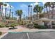 Beautiful community featuring lush landscaping, covered seating areas, and dedicated 5-minute parking at 7119 S Durango Dr # 211, Las Vegas, NV 89113