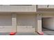 Attached garage featuring a secure door, offering convenient parking and storage at 7119 S Durango Dr # 211, Las Vegas, NV 89113