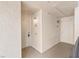 Hallway showing two unit entry doors and overhead lighting at 7119 S Durango Dr # 211, Las Vegas, NV 89113