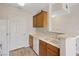 Bright kitchen features wood cabinets, white countertops, and an undermount sink at 7119 S Durango Dr # 211, Las Vegas, NV 89113
