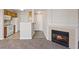 Open floorplan to the kitchen with a fireplace at 7119 S Durango Dr # 211, Las Vegas, NV 89113